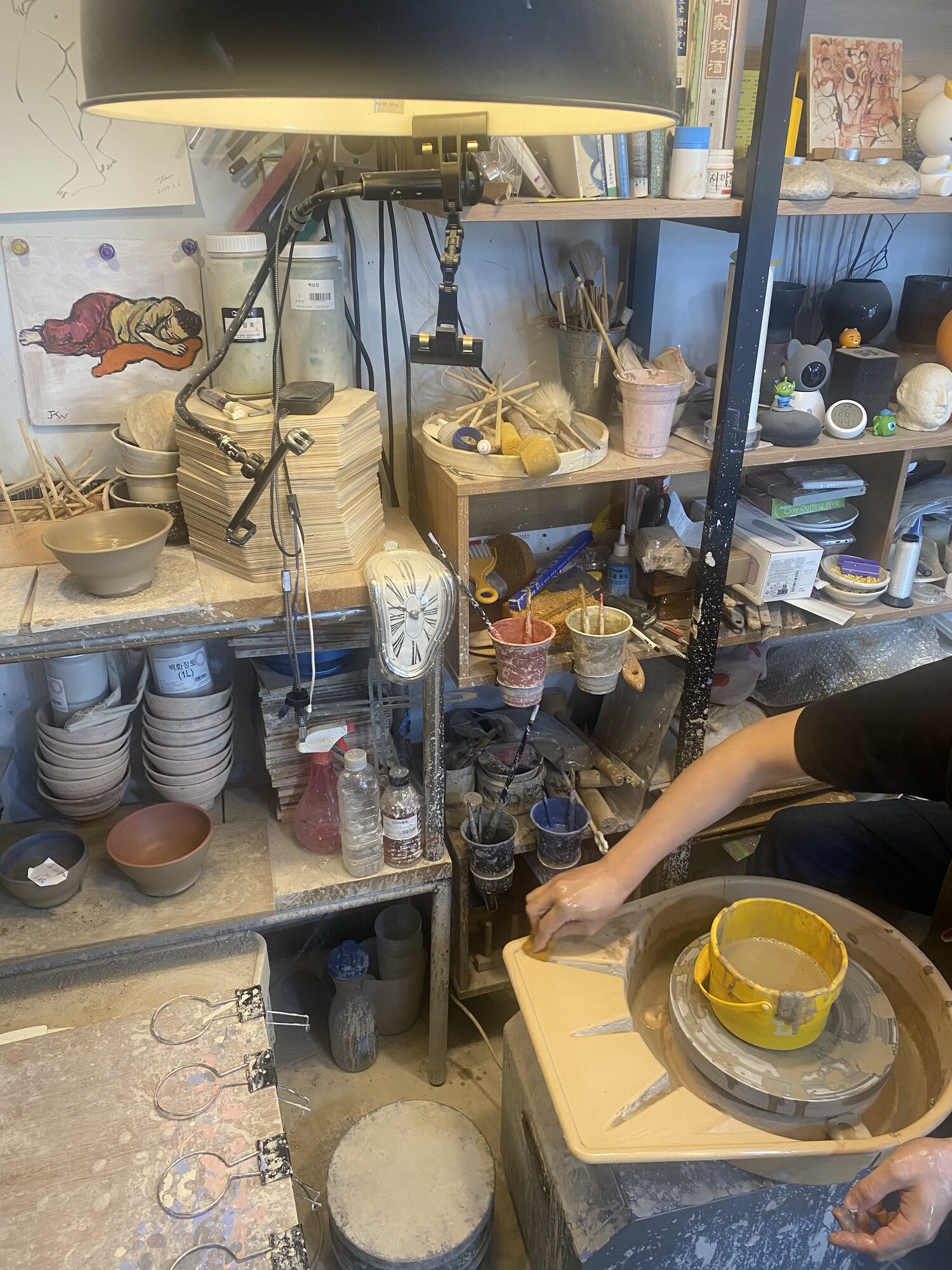 At the potter's wheel